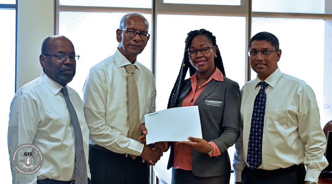 Premier Smith Receives Insurance Cheque For Restoration Of Admin Complex